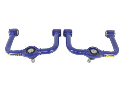 SuperPro 05-21 Nissan Frontier - Fixed Offset Upper Control Arm Set - Camber/Caster Correction
